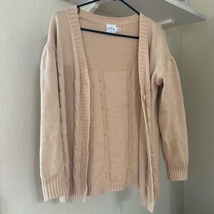 Women’s beige knitted button up